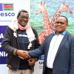 The Ag. SG Dr. James Njogu together with reknown author Mwalimu Wallah Bin Wallah during the 2023 Global African Diaspora Forum in Bomas of Kenya.