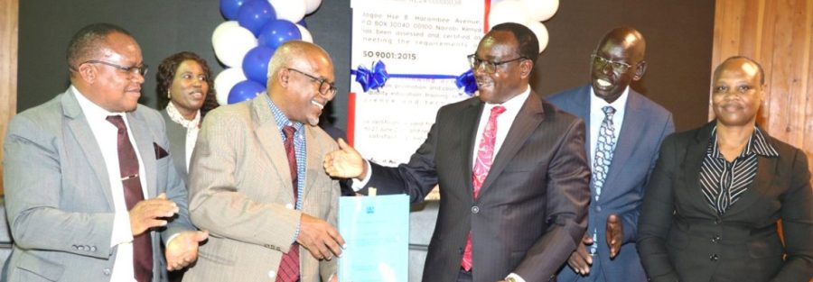 Hon. Julius Migos, Ogamba, EBS, Cabinet Secretary for Education and the KNATCOM Board Chairman Prof. Mohamed Said Rajab, Ph.D., EBS signs the KNATCOM - GoK Performance Contract.